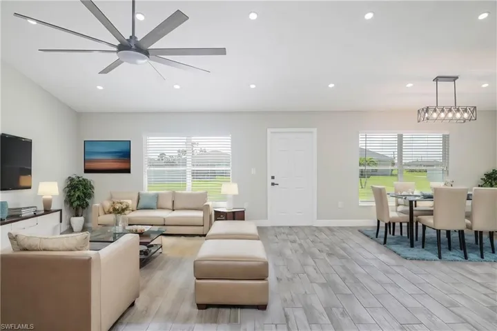Photo includes reality renovation and/or staging to showcase the possibility of the living/dining area. Design services included with purchase!