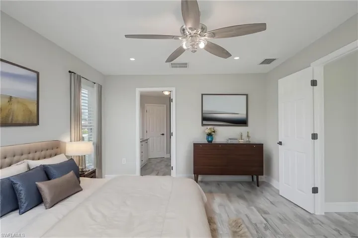Photo includes reality renovation and/or staging to showcase the possibility of the Primary bedroom. Design services included with purchase!