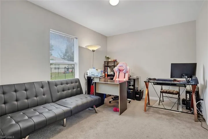 Home office featuring carpet floors