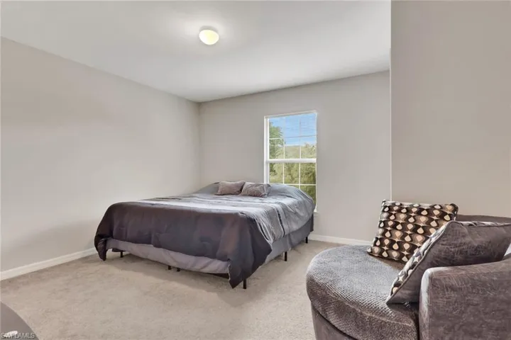 Bedroom featuring carpet