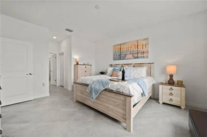 Master bedroom with 2 walk-in closets