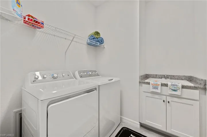 Spacious Laundry room with washtub