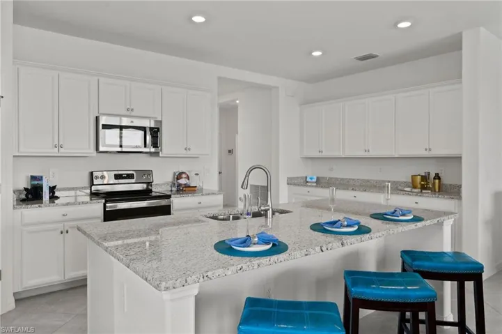Expansive center island and breakfast bar