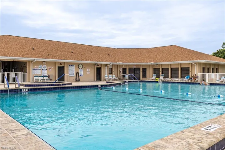 Community pool featuring a patio area