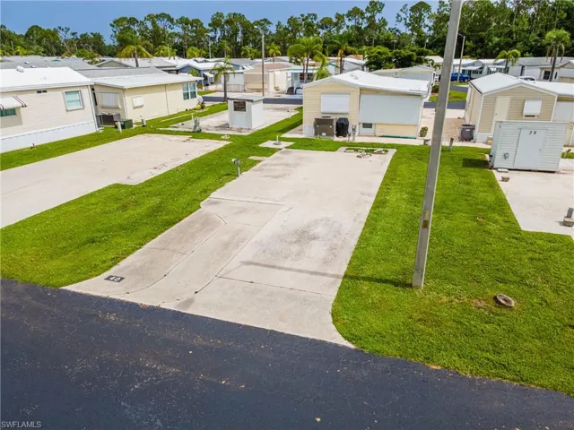 View of front of home featuring a residential view and a front yard