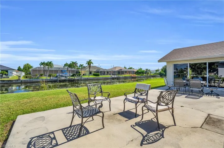 View of patio / terrace featuring a lanai