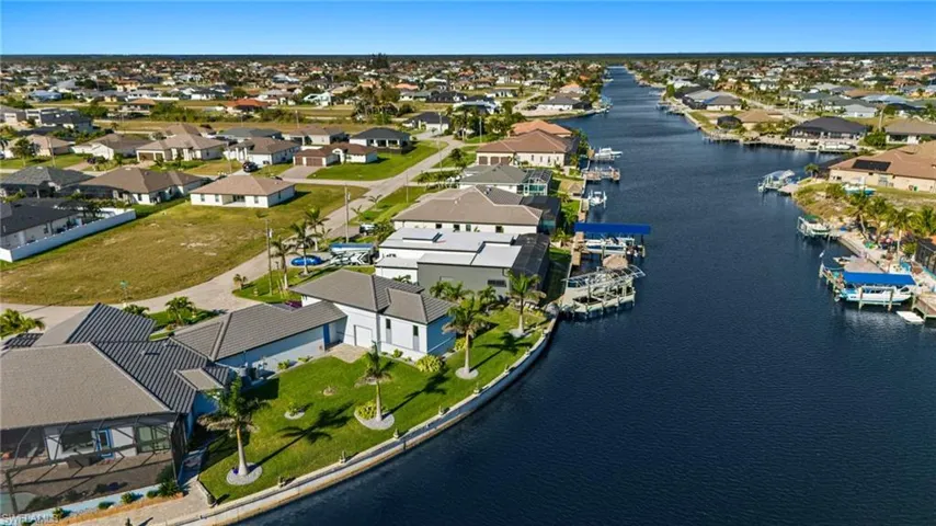 Aerial view of residential area with a nearby body of water