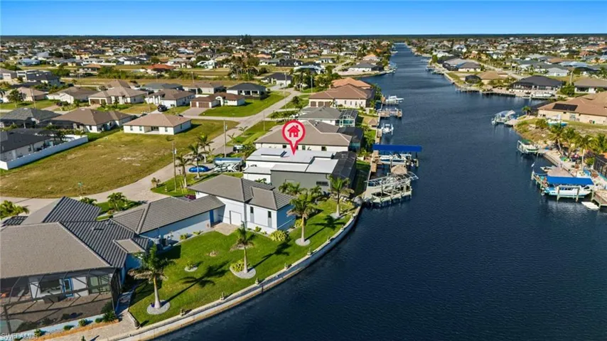 Aerial view of residential area with a large body of water