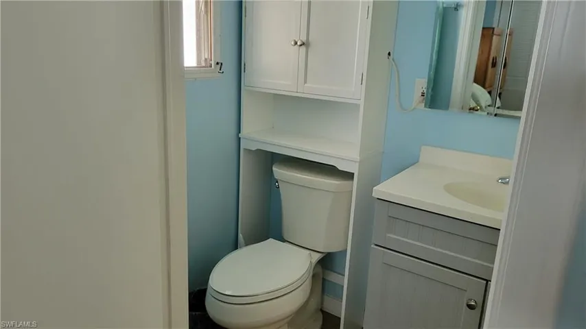 Bathroom with vanity and toilet