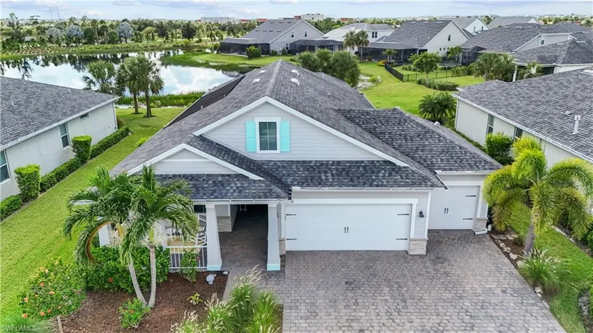 3 Car Garage and Front Porch.  16160 Bluestem Ln. Babcock Ranch, FL 33982