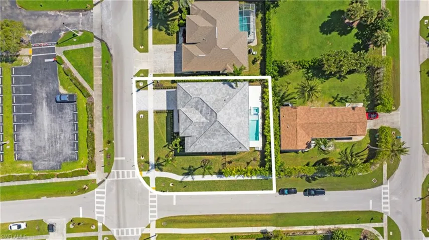 Aerial perspective of suburban area with property boundaries highlighted