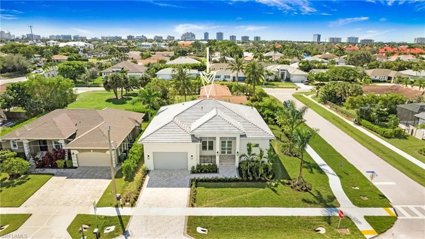 View from above of property featuring city skyline