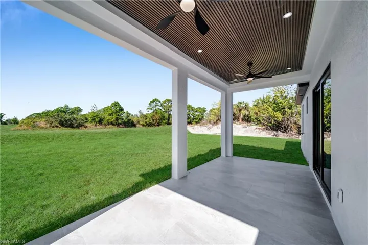 View of patio featuring ceiling fan