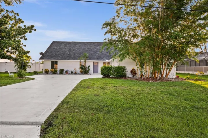 View of front of house with a front yard