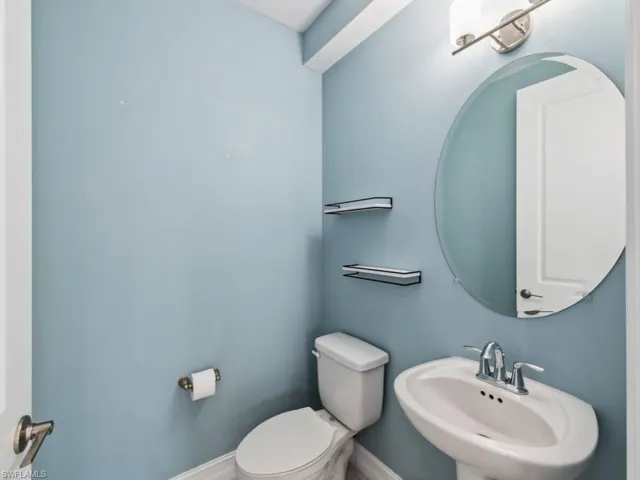 Bathroom with sink and toilet