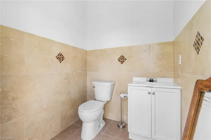 Half bathroom in the detached garage.