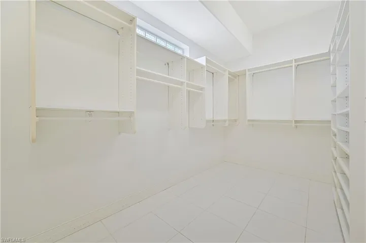 Primary closet with floor safe