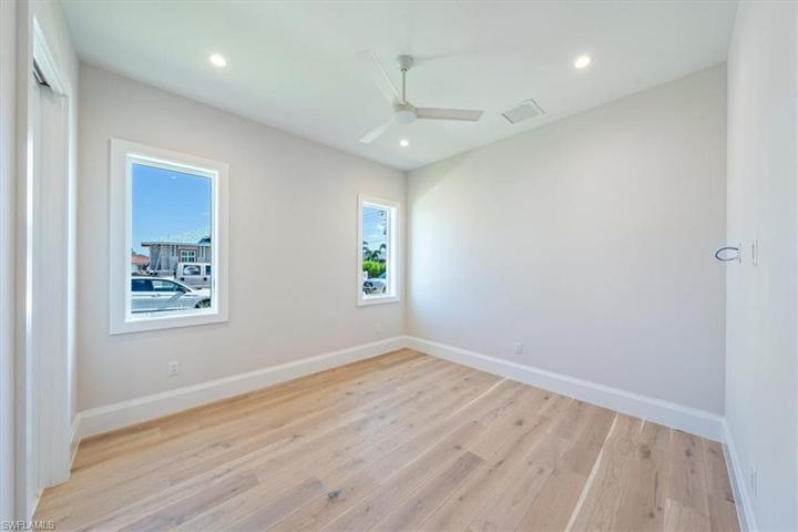 Bedroom 2 is located on the front of the home with a spacious and bright en-suite bathroom.