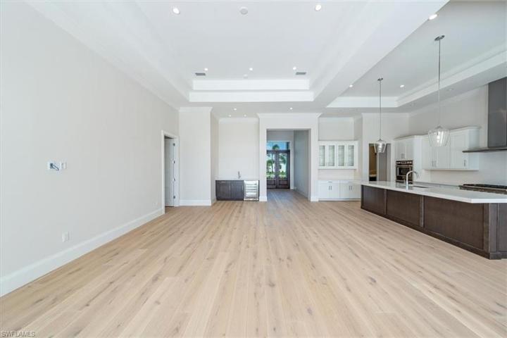 The great room features a wet bar with wine chiller.