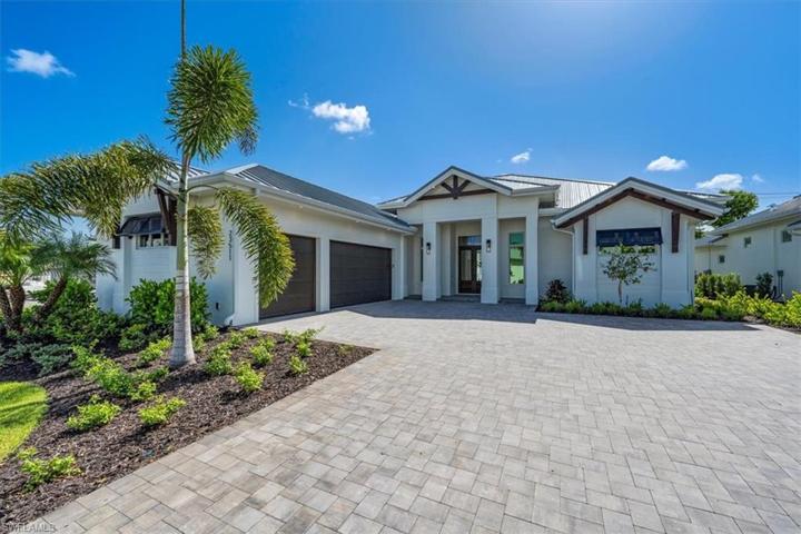 Each home in Coconut Landing features standing seam metal roofing, hardi-plank stucco treatment, impact glass doors and windows, and decorative Bahama shutters.