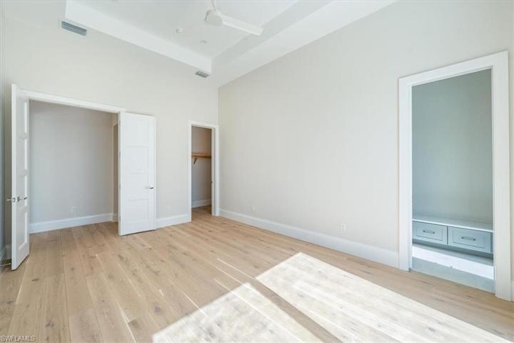 Bedroom 4 features double door entry, walk-in closet, sliders out to the pool, and a large en-suite bathroom with pool deck access.