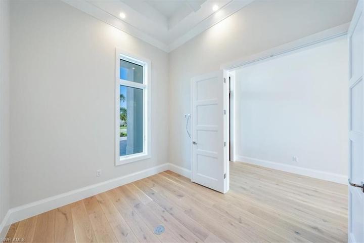 The office is located at the front of the home just inside the front entry. Double doors offer the option of an open airy feel or privacy.