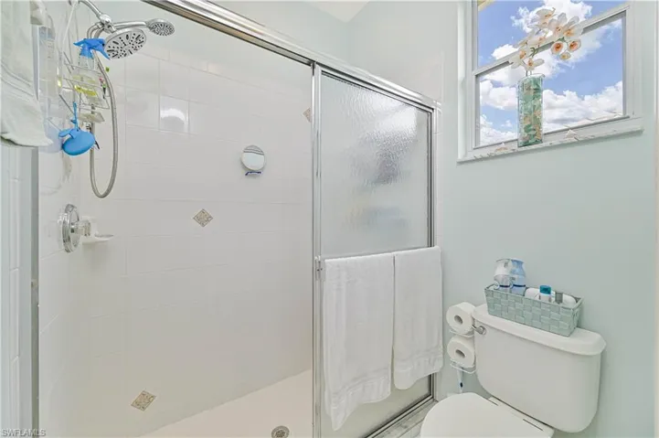 Bathroom featuring toilet and walk in shower