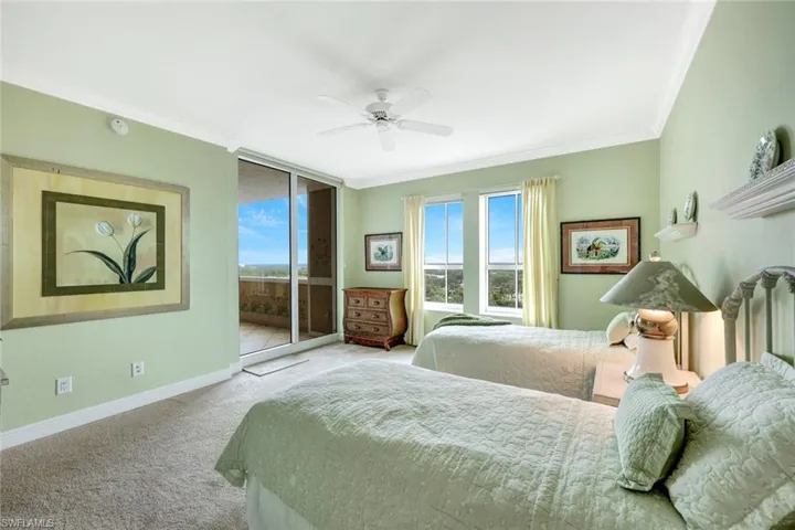 Guest Suite with Sliding Glass Doors to Balcony