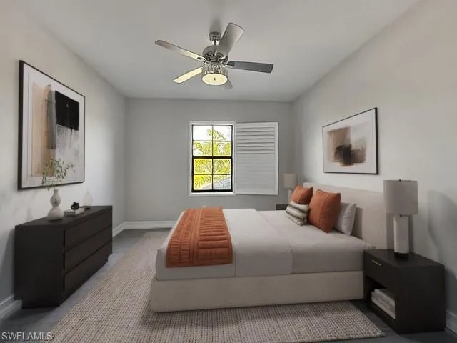 Bedroom featuring baseboards and a ceiling fan