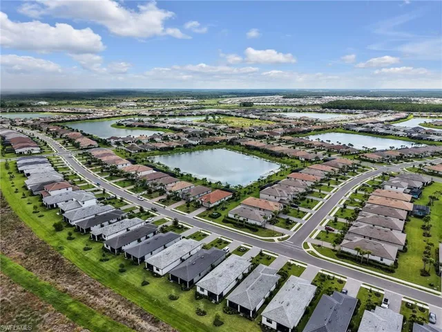 Aerial view of home and surrounding home