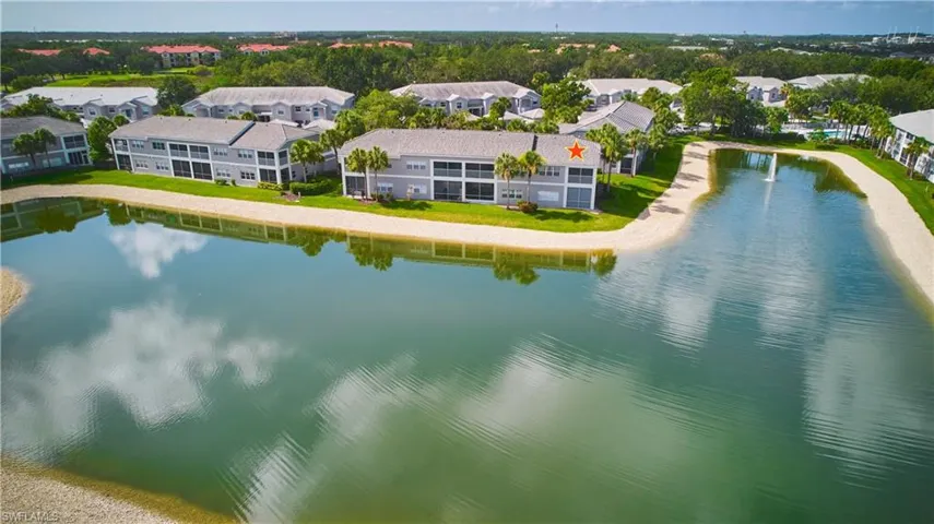 Aerial perspective of the condo complex around the lake