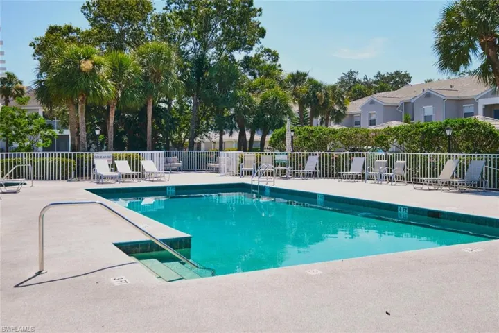 Community pool featuring a patio area.