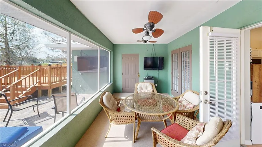 Sunroom with ceiling fan