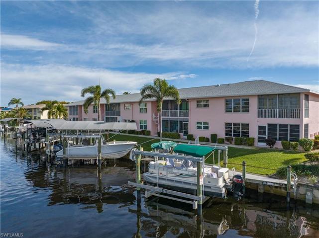 Back of condo and canal