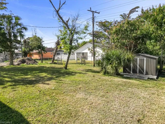 View of yard with a shed