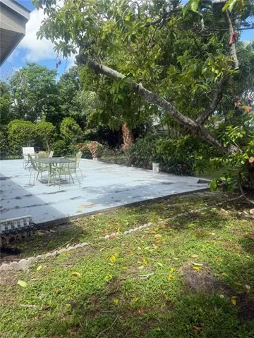 View of yard with a patio area