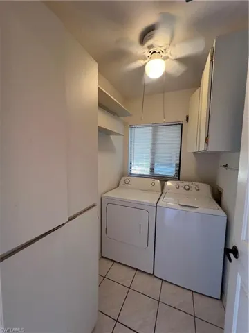 LAUNDRY ROOM WITH NICE WINDOW, AND NEWER WASHER/DRYER INCLUDED.  ALSO STORAGE.