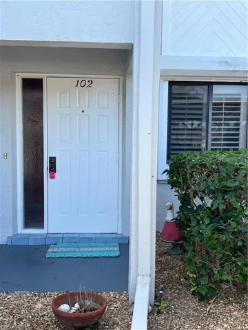 FRONT DOOR STEPS AWAY FROM YOUR CARPORT SPACE
