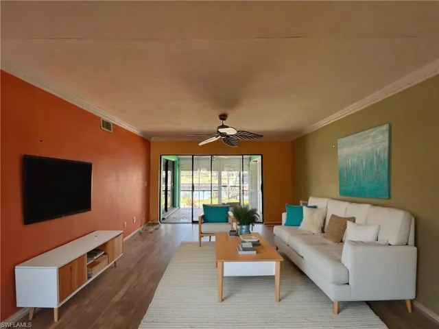 LG OPEN LIVING AREA OPENS UP TO LANAI, WITH WONDERFUL VIEW OF WATER, AND YOUR PRIVATE BOAT DOCK/LIFT