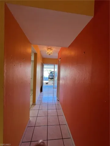 HALLWAY AT ENTRY, NICE LAUNDRY ROOM AND CLOSET