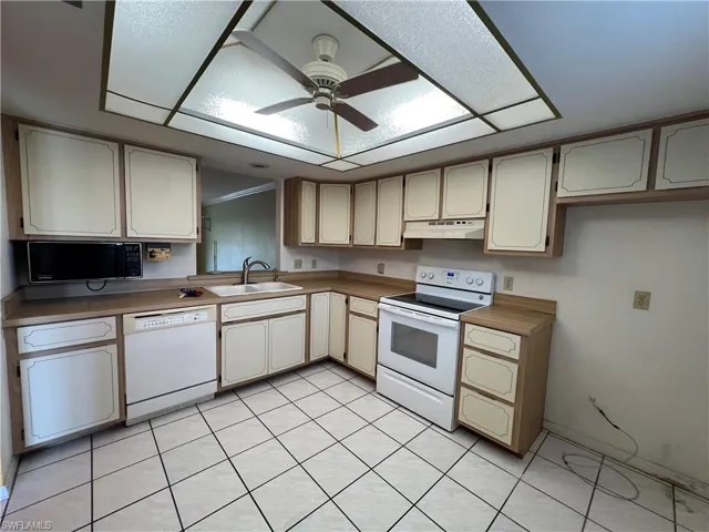MAKE THIS YOUR DREAM KITCHEN, LG FOR MANY NEW CABINETS, AND YOU COUKD OPEN UP INTO DINNING AND LIVING AREAS.