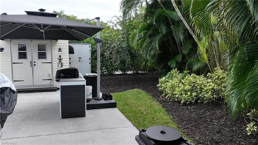 View of patio with area for grilling