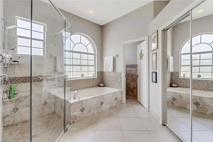 Bathroom walk in shower, and a large amount of sunlight