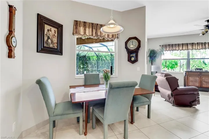Dining space with plenty of natural light and ceiling fan