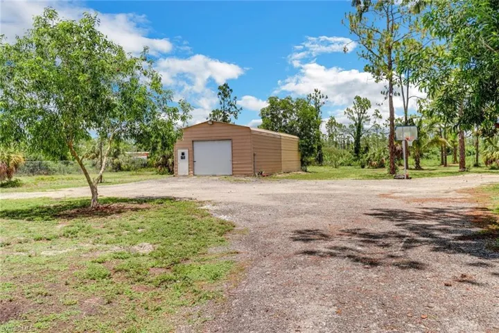 20x40 metal outbuilding with roll up door