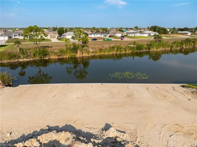 Water view featuring nearby suburban area