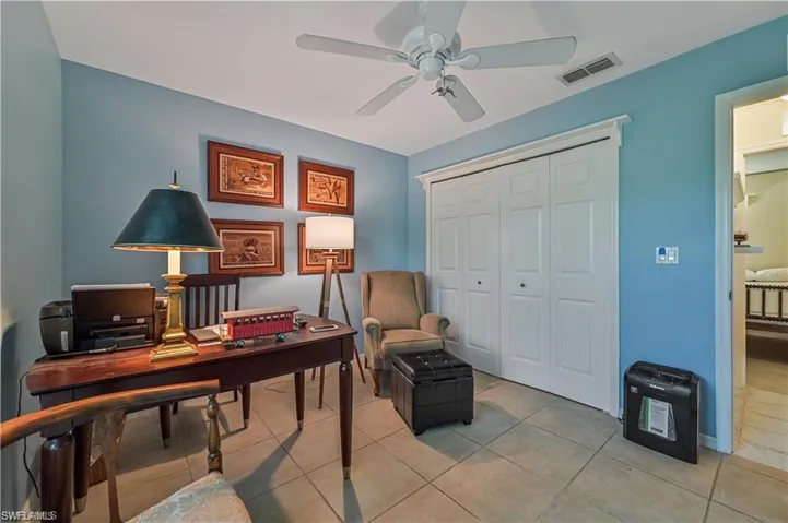 Tiled office space with ceiling fan