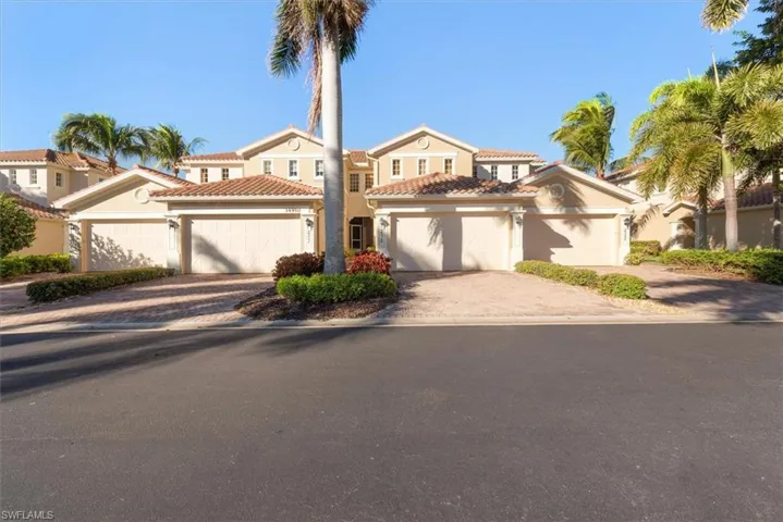 Mediterranean / spanish home with stucco siding and decorative driveway