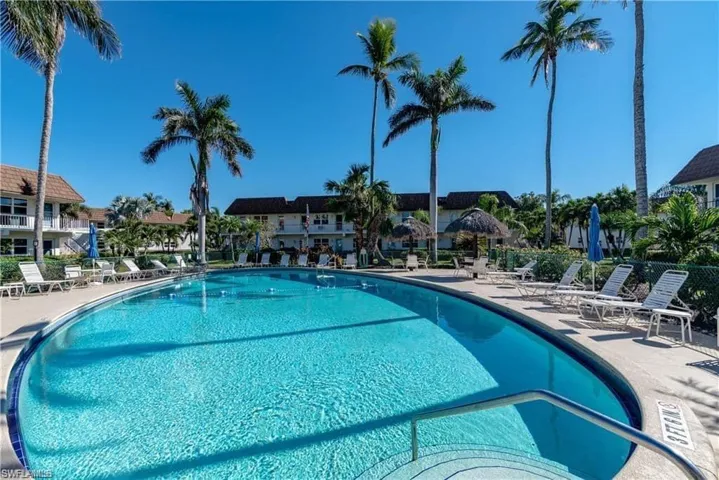 Community pool with a patio area