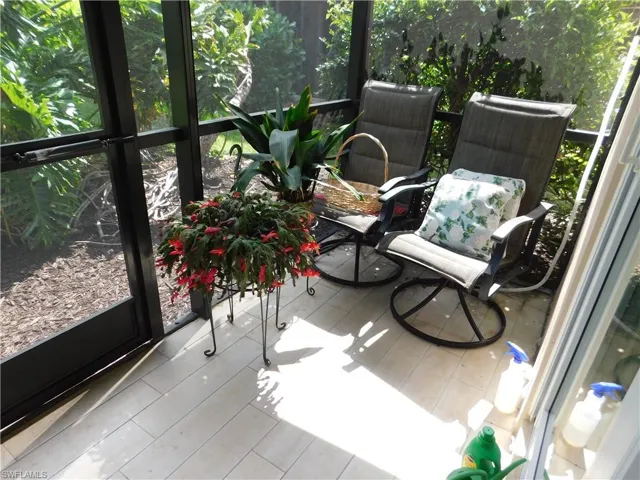 Sunroom featuring wood finished floors